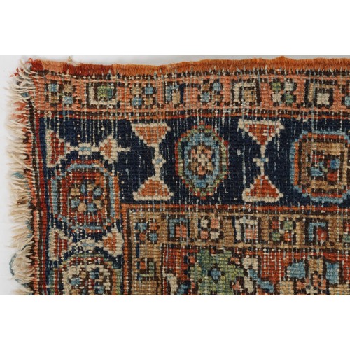 2196 - Rectangular Persian brown ground rug having a repeat diamond central field, 270cm x 157cm