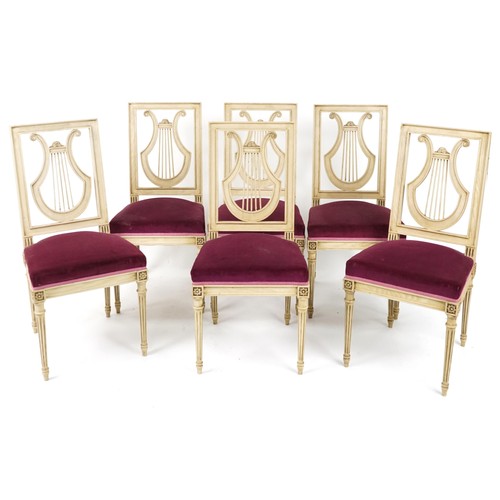 2055 - Set of six French cream painted dining chairs with lyre backs, pink upholstered seats on fluted legs... 