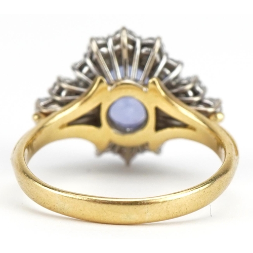 3035A - 18ct gold Sri Lankan sapphire and diamond four tier cluster ring, weight of the sapphire 6.54g, the ... 