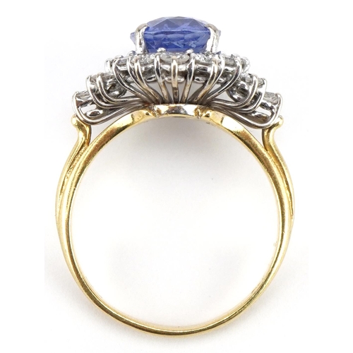 3035A - 18ct gold Sri Lankan sapphire and diamond four tier cluster ring, weight of the sapphire 6.54g, the ... 