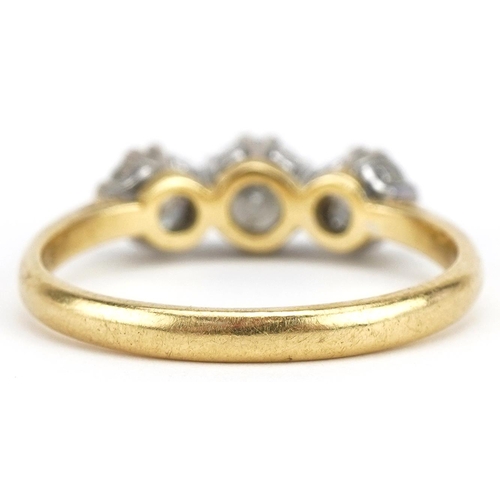 3045A - 18ct gold diamond three stone ring, total diamond weight approximately 1.45 carat, size U, 4.5g