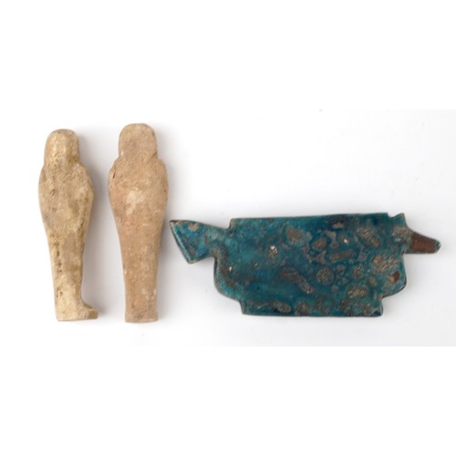 1175 - Two Egyptian style ushabtis and a faience glazed amulet, the largest 16cm wide