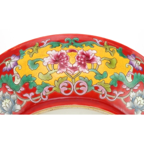 1299 - Chinese porcelain shallow dish hand painted in the famille rose palette and iron red with bats and f... 