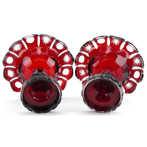 130 - Pair of Bohemian ruby flashed cut glass pedestal bonbon dishes, each 14cm high x 16.5cm in diameter