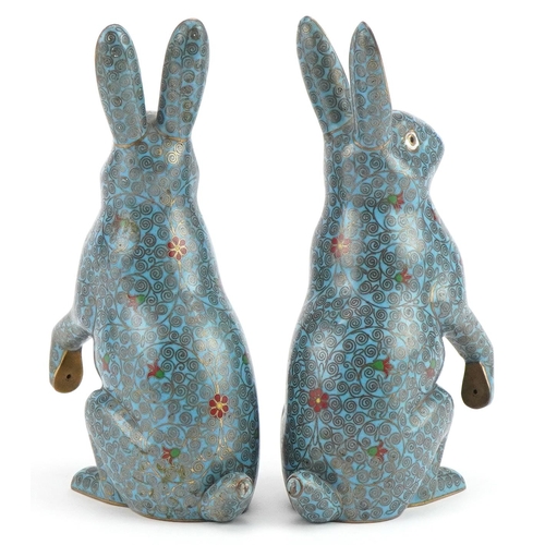 318 - Pair of Chinese cloisonne hares enamelled with flowers, each 13cm high