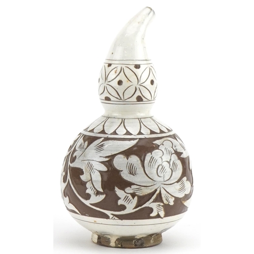 1288 - Chinese porcelain gourd vase having a white glaze incised with flowers, 16.5cm high