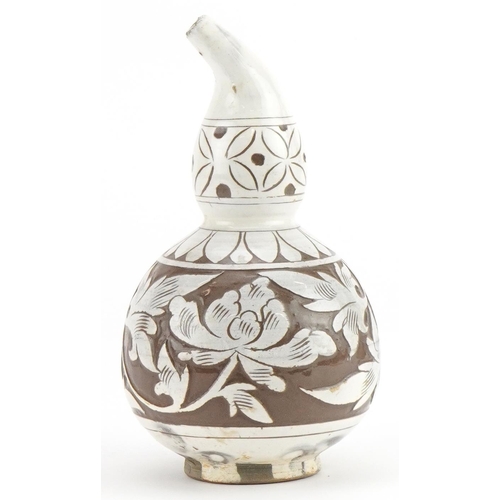 1288 - Chinese porcelain gourd vase having a white glaze incised with flowers, 16.5cm high