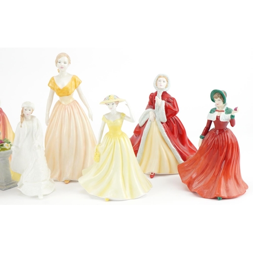 385 - Ten collectable figures and figurines including Royal Doulton Ritz Bellboy and Royal Doulton Alexand... 