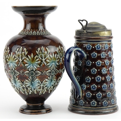 28 - Doulton Lambeth, Art Nouveau Royal Doulton stoneware vase and jug with silver plated mounts, the vas... 