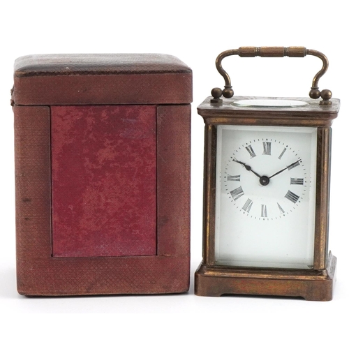 231 - French brass cased carriage clock with enamelled dial having Roman numerals and travel case, 11cm hi... 