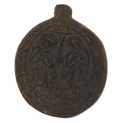 185 - Antique Ottoman Greek horn medallion carved with The Virgin and Child and saints, 5cm high