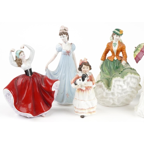 387 - Ten collectable figurines including Royal Doulton Henley HN3367 and Wedgwood, the largest 20.5cm hig... 