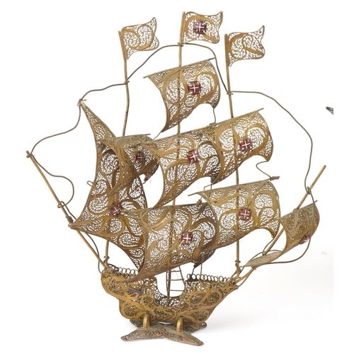 1123 - Silvered cast metal Maltese ship table lamp with shade and a similar gilt filigree sculpture, the la... 