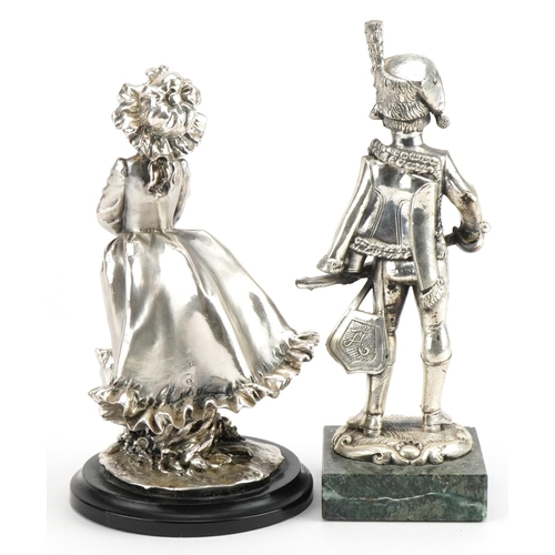 165 - Brunel, Italian silver filled figure of a Dutch girl with kitten and a similar example of a soldier ... 