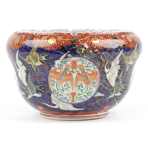 1127 - Japanese porcelain jardiniere hand painted with cranes, phoenixes and fish, 27cm in diameter