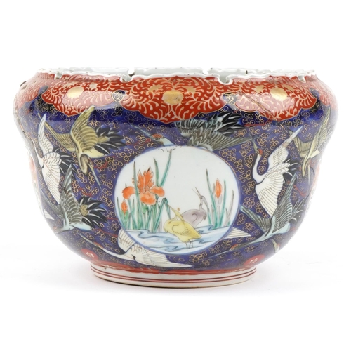 1127 - Japanese porcelain jardiniere hand painted with cranes, phoenixes and fish, 27cm in diameter