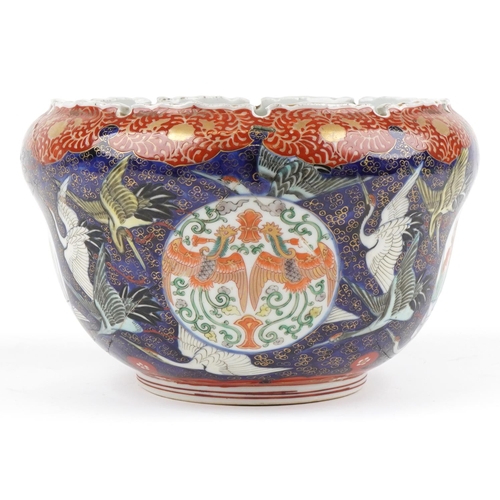 1127 - Japanese porcelain jardiniere hand painted with cranes, phoenixes and fish, 27cm in diameter