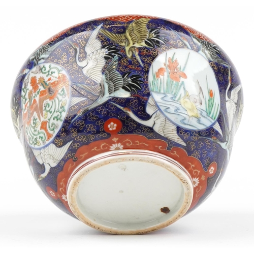 1127 - Japanese porcelain jardiniere hand painted with cranes, phoenixes and fish, 27cm in diameter