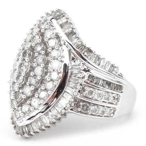 2040 - 9ct white gold diamond cocktail ring set with round brilliant cut and baguette cut diamonds, total d... 