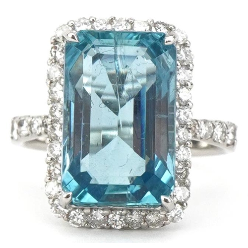 Large platinum emerald cut aquamarine and diamond ring with diamond set shoulders, the aquamarine approximately 8.02 carat, total diamond weight approximately 0.78 carat, size M, 8.0g