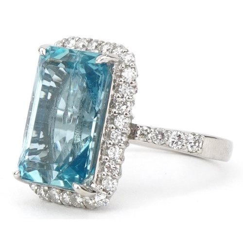 2064 - Large platinum emerald cut aquamarine and diamond ring with diamond set shoulders, the aquamarine ap... 