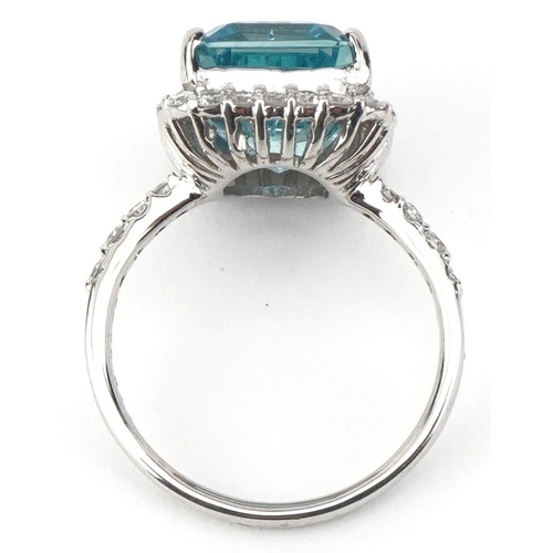 2064 - Large platinum emerald cut aquamarine and diamond ring with diamond set shoulders, the aquamarine ap... 