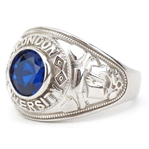 2095 - Silver blue cubic zirconia London University varsity ring, size V/W, 12.0g