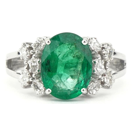 2186 - 18ct white gold oval emerald and marquise cut diamond cluster ring, the emerald approximately 2.52 c... 