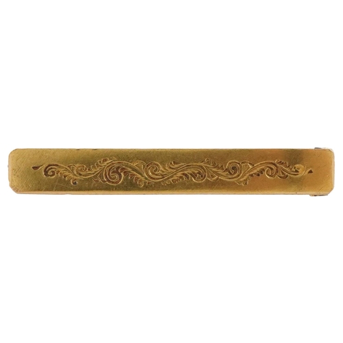 2759 - 18ct gold floral engraved bar brooch, 3.4cm wide, 1.6g