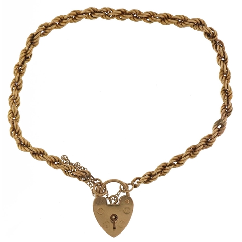 2157 - 9ct gold rope twist bracelet with 9ct gold love heart padlock, 18cm in length, 4.7g