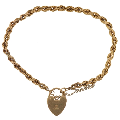 2157 - 9ct gold rope twist bracelet with 9ct gold love heart padlock, 18cm in length, 4.7g