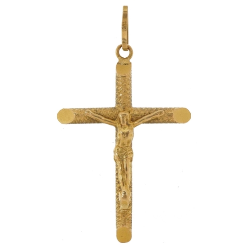 2145 - 18ct gold crucifix pendant, 3.6cm high, 1.9g