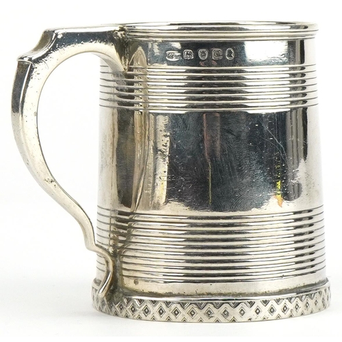 110 - George III engine turned silver christening tankard, indistinct maker's mark London 1811, 8cm high, ... 