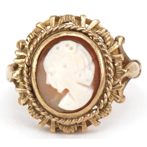 2128 - 9ct gold cameo shell ring carved with a maiden with ornate setting, size L, 4.5g