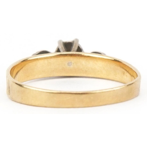 2566 - 18ct two tone gold diamond solitaire ring with engine turned shoulders, size K/L, 2.1g