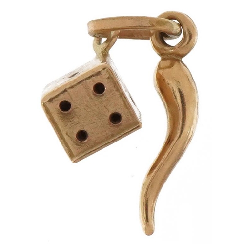 2677 - 9ct gold horn of plenty and dice charm, 1.6cm high, 0.4g