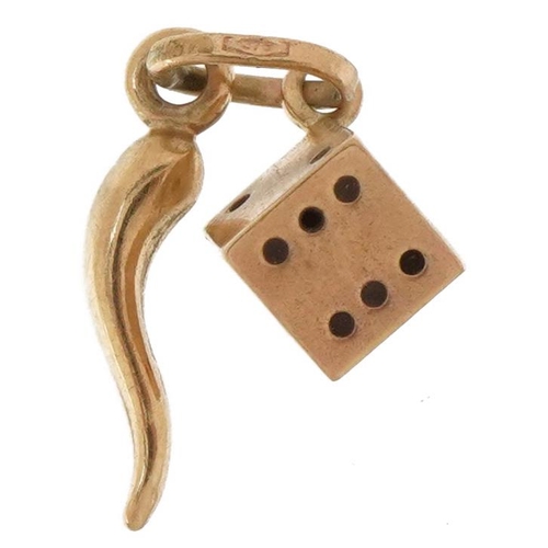 2677 - 9ct gold horn of plenty and dice charm, 1.6cm high, 0.4g