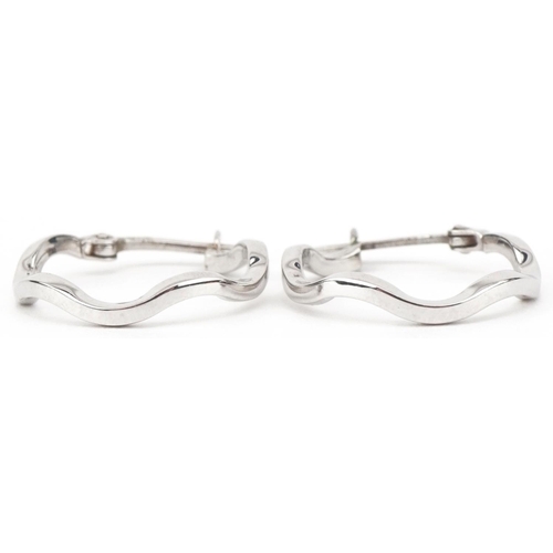 2673 - Pair of 9ct white gold hoop earrings, 1.8cm in diameter, 1.1g