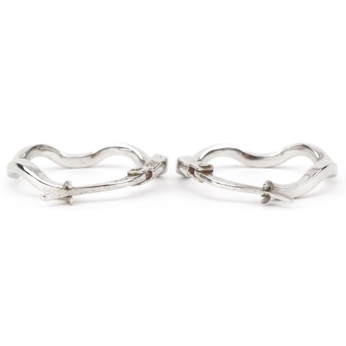 2673 - Pair of 9ct white gold hoop earrings, 1.8cm in diameter, 1.1g