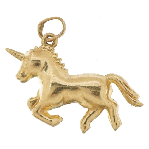 2074 - 9ct gold unicorn charm, 2cm in length, 0.9g