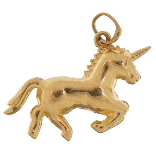 2074 - 9ct gold unicorn charm, 2cm in length, 0.9g