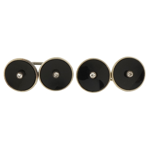 2200 - Pair of Art Deco 18ct white gold, diamond and black enamel cufflinks, 2.5cm in length, 5.6g