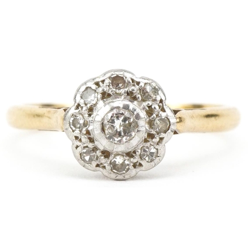 2006 - 18ct gold and platinum diamond flower head ring, the central diamond approximately 2.50mm in diamete... 