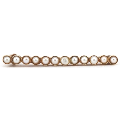 2767 - Unmarked gold seed pearl bar brooch, tests as 15ct gold, 3.2cm wide, 2.2g