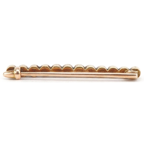 2767 - Unmarked gold seed pearl bar brooch, tests as 15ct gold, 3.2cm wide, 2.2g