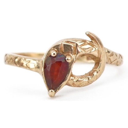 2188 - 9ct gold garnet serpent ring, size F, 0.9g