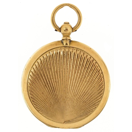 2113 - 18ct gold engine turned locket housing a flint arrow head, 3.3cm high, 10.0g