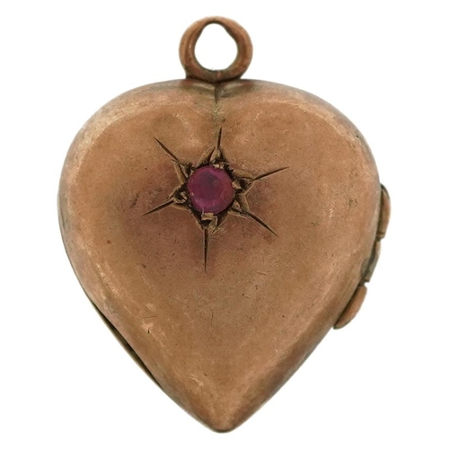 2657 - 9ct gold ruby love heart locket, 1.9cm high, 2.8g