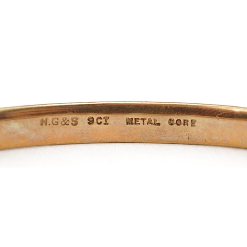 2750 - Large 9ct gold metal core bangle, 8.5cm in diameter, 27.0g