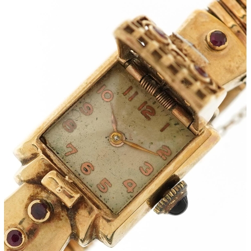 2147 - Ladies 9ct gold bracelet wristwatch set with a diamond, rubies and sapphire crown, the case 16mm wid... 